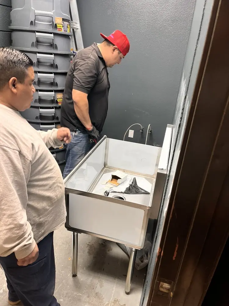 Commercial plumbing and sink installation in Katy